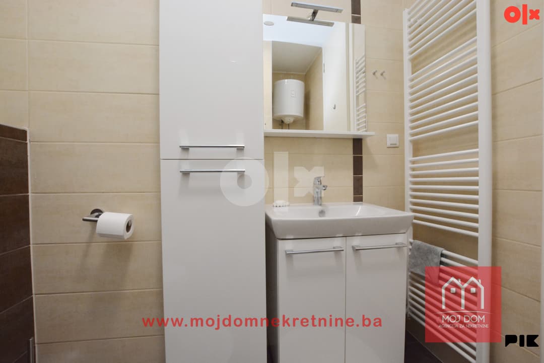 Three-bedroom apartment with a loggia, 67m2, in the Unigradnja Otoka building photo 13